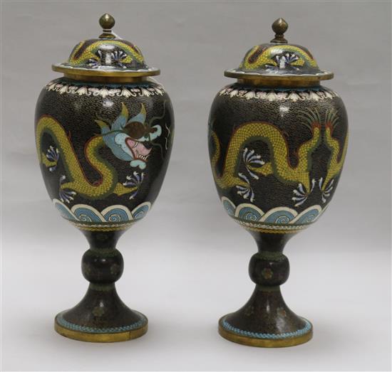 A pair of Chinese cloisonne enamel dragon jars and covers, c.1923 total height 30cm